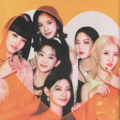 stayc members looking at the camera from a heart-shaped cutout in a piece of yellow glass. From the young-luv.com album promotion photos